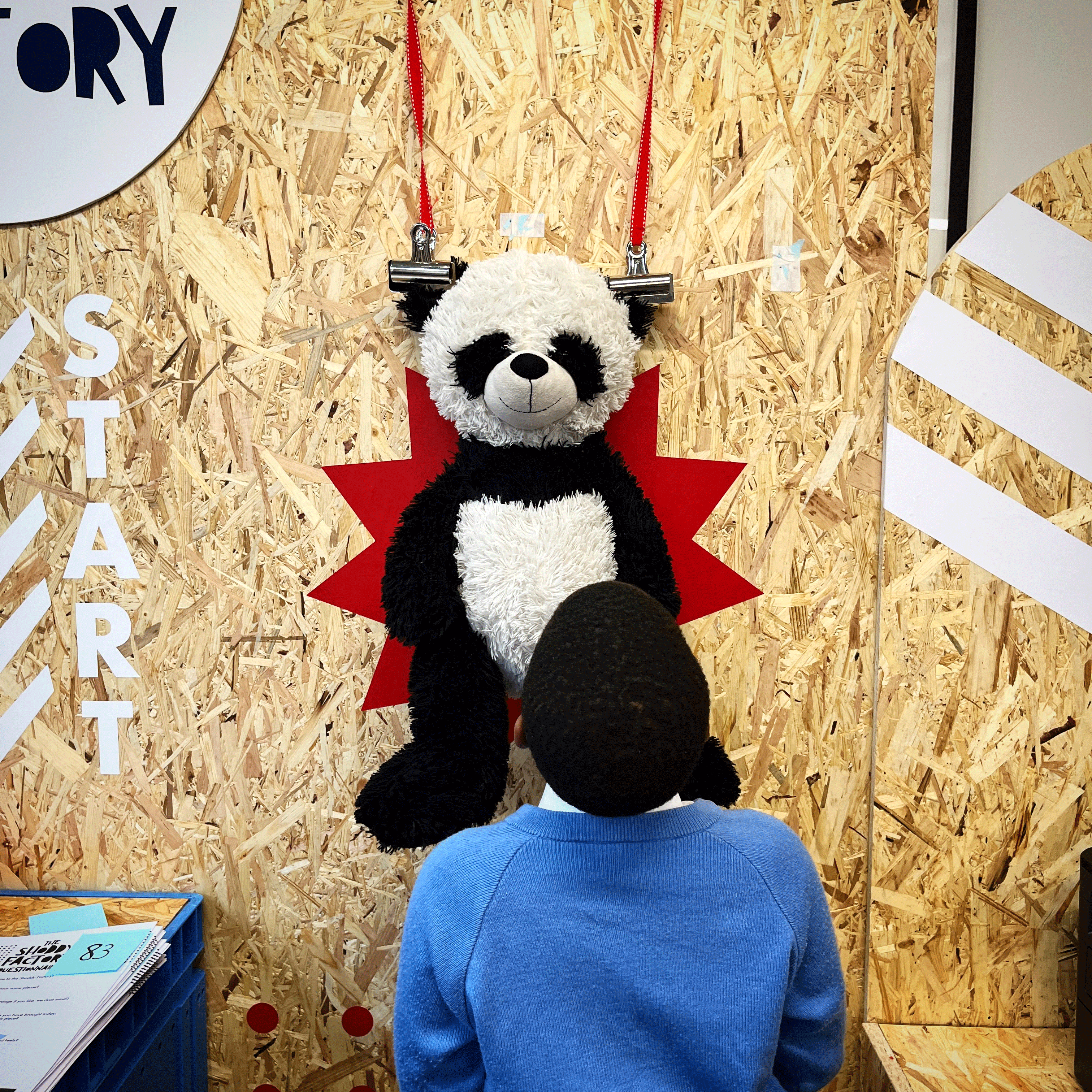 Shoddy Factory Panda on a wall