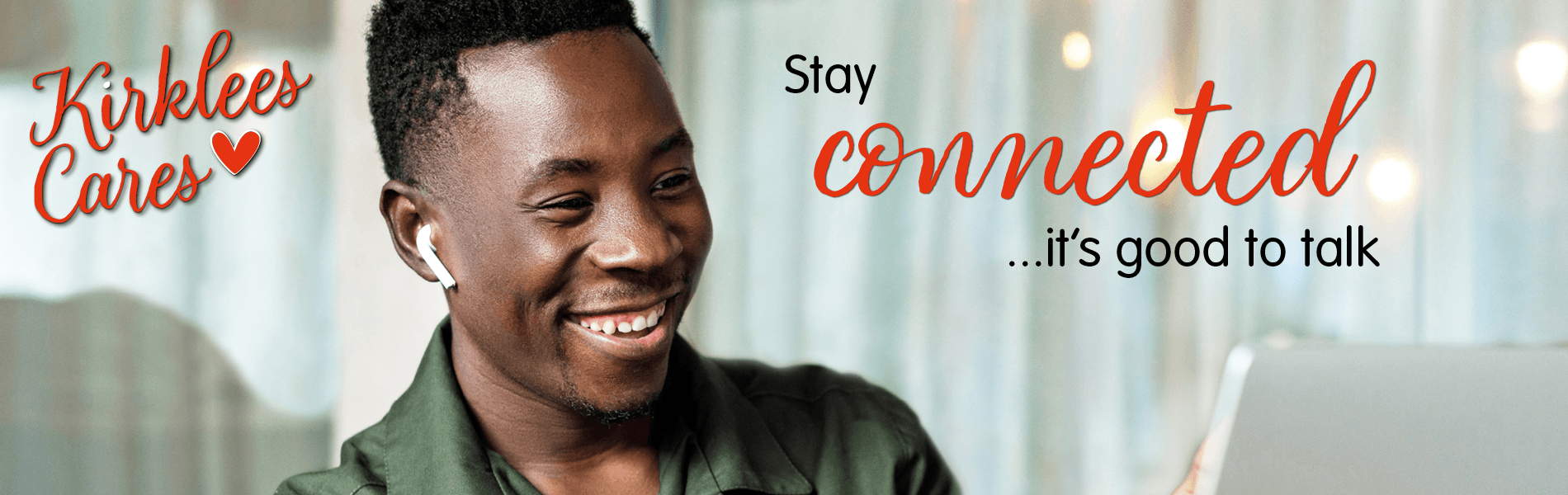 A man smiling with a message saying stay connected... it's good to talk.