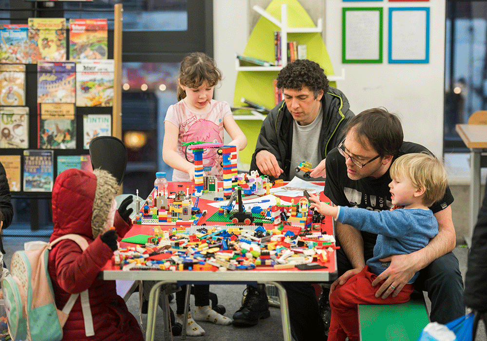 Children playing with Lego at the library