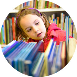 Girl looking at books