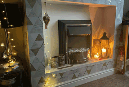 Battery powered lights surrounding a television