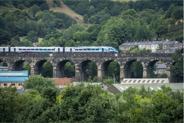 A transpennine train going over a bridge