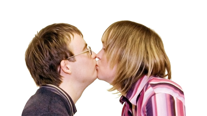 Two people kissing