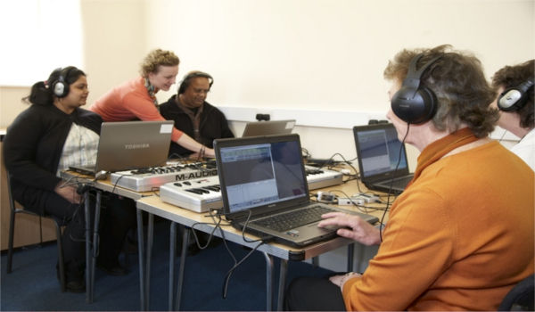 People in a classroom with computers