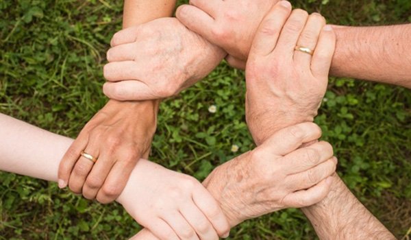 People linking hands
