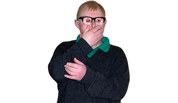 Person holding their hand to their face