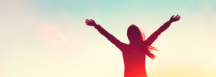 Woman holding her hands in the air