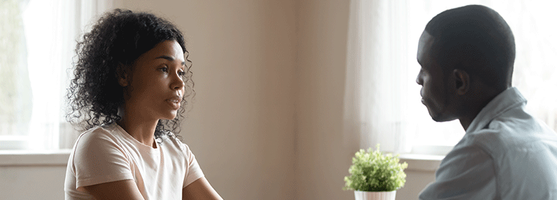 One person offering support to another