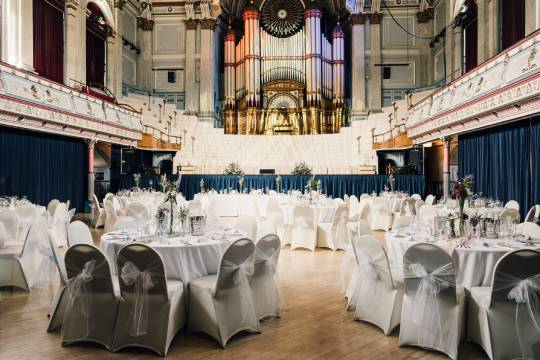 A group of wedding tables set up at the town hall