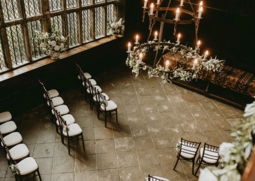 Chairs set up inside Oakwell Hall for a wedding
